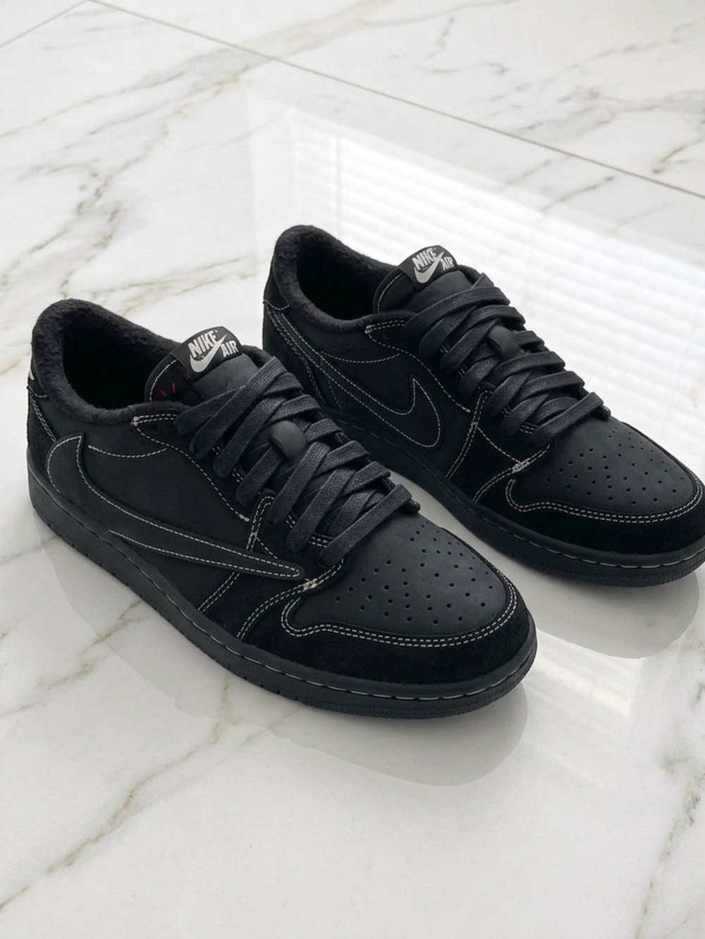 Jordan Black Low-Top Sneakers with White Stitching